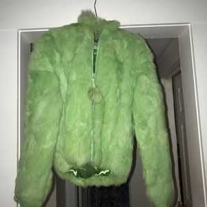 Green fur coat, size medium. NEVER WORN